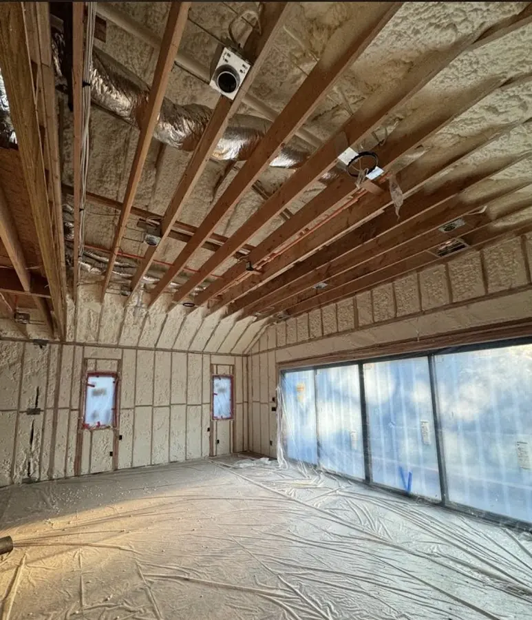 Interior walls and ceiling insulated with spray foam during new construction in Avocado Heights